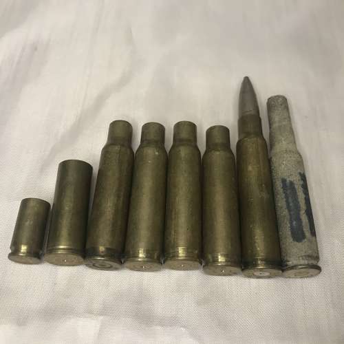 8 Spent Brass Cartridges